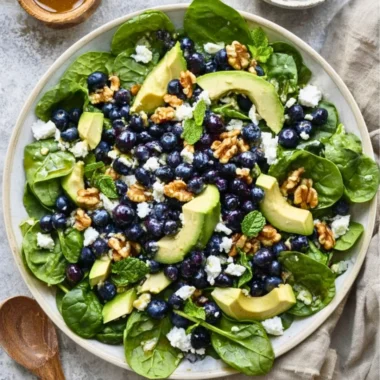 Fresh spinach blueberry salad ready in 20 minutes, a healthy and vibrant dish.