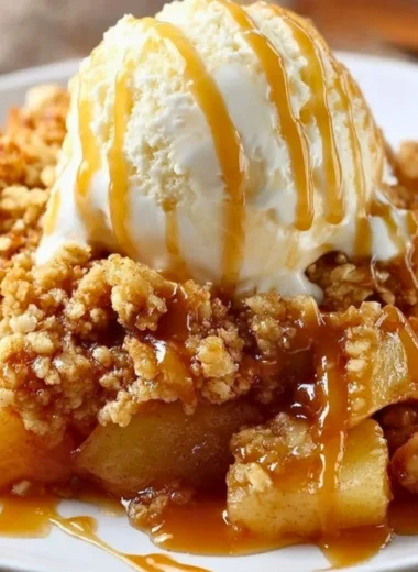 Delicious baked apple crumble topped with a golden brown crumb layer