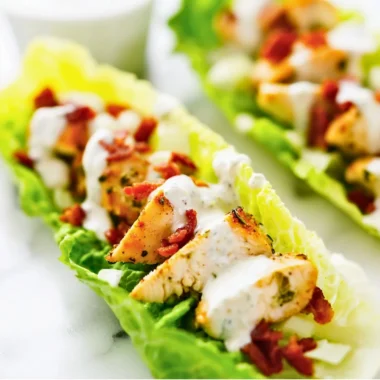 Plate of Chicken Bacon Ranch Lettuce Wraps with fresh ingredients.