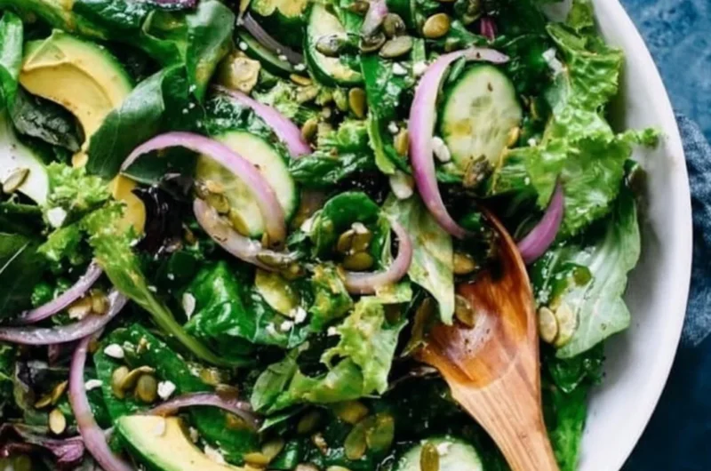 Colorful and fresh everyday salad recipe with various vegetables and toppings.