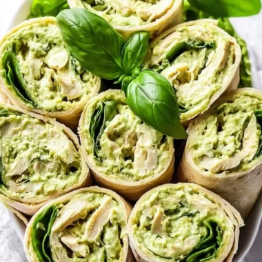 Healthy and easy pesto chicken salad with vibrant vegetables and grilled chicken