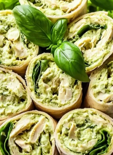 Healthy and easy pesto chicken salad with vibrant vegetables and grilled chicken