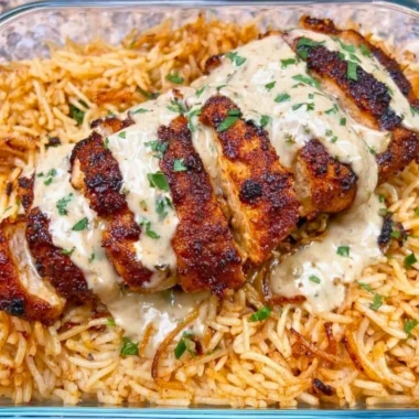 Creamy Cajun chicken with rice, high in protein and packed with flavor.
