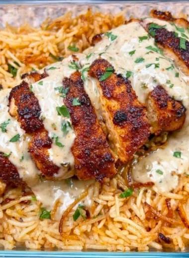 Creamy Cajun chicken with rice, high in protein and packed with flavor.