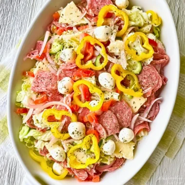 Delicious Italian Sub Salad featuring fresh ingredients and toppings.