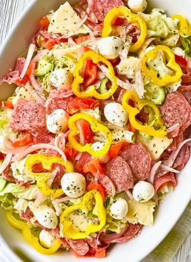 Delicious Italian Sub Salad featuring fresh ingredients and toppings.