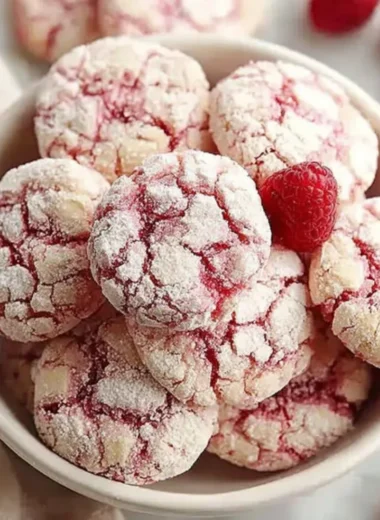 Plate of delicious Raspberry Sugar Cookies with fresh raspberries