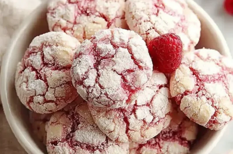 Plate of delicious Raspberry Sugar Cookies with fresh raspberries