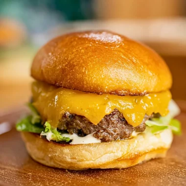 Delicious homemade smash burger served on a plate with toppings