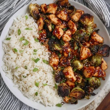 Crispy Air Fried Chicken breast with roasted Brussels sprouts on a plate
