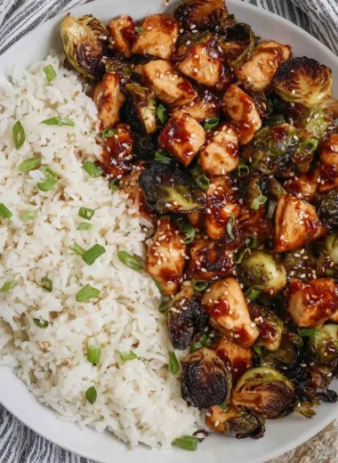 Crispy Air Fried Chicken breast with roasted Brussels sprouts on a plate