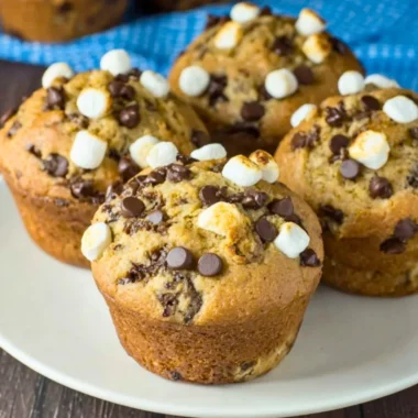 Freshly baked Banana S'mores Muffins with chocolate and marshmallows
