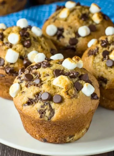 Freshly baked Banana S'mores Muffins with chocolate and marshmallows