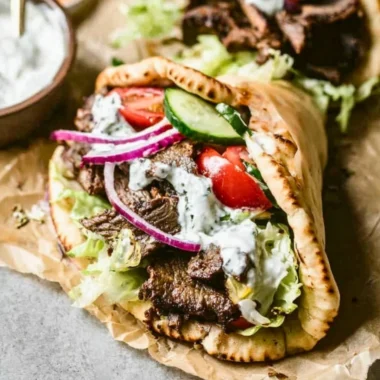 Homemade Beef Gyros served with fresh vegetables and tzatziki sauce