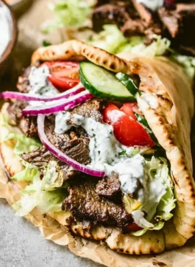 Homemade Beef Gyros served with fresh vegetables and tzatziki sauce