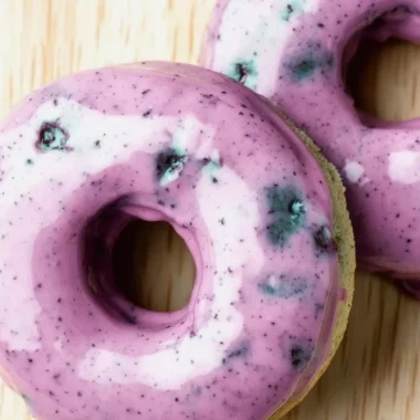 Homemade blueberry cake donuts glazed with a sweet icing