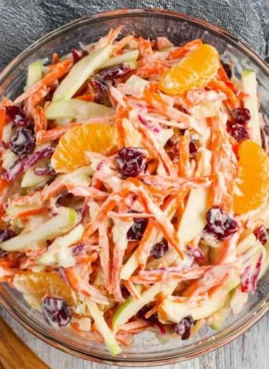 Delicious Carrot Apple Salad with fresh carrots and apples in a bowl.