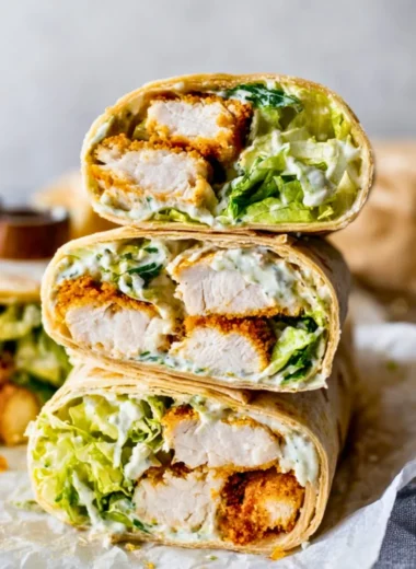 Delicious Chicken Caesar Wrap filled with chicken, lettuce, and Caesar dressing.