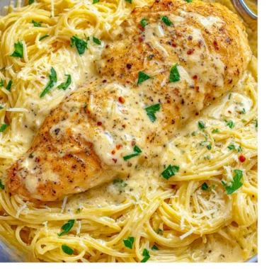 Delicious Crock Pot Angel Chicken served on a plate with garnishes