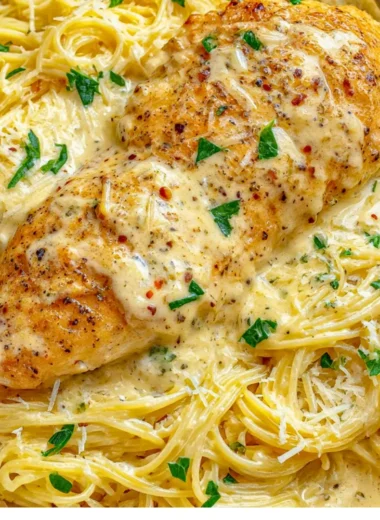 Delicious Crock Pot Angel Chicken served on a plate with garnishes