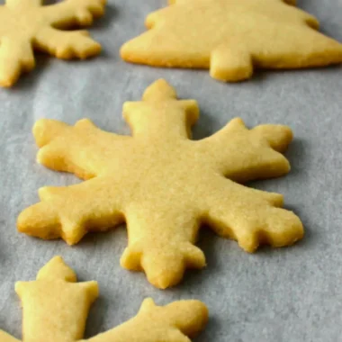 Delicious sugar cookies decorated with colorful icing and sprinkles
