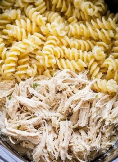 Plate of Garlic Parmesan Chicken Pasta garnished with parsley