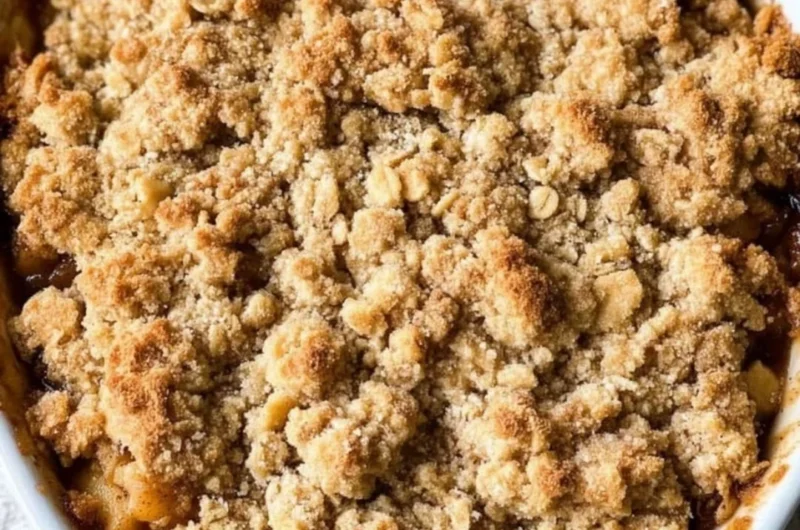 Delicious gluten-free apple crisp dessert topped with oats and nuts