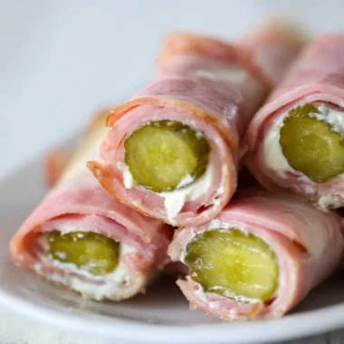 Ham and Pickle Roll-ups with Cream Cheese on a plate
