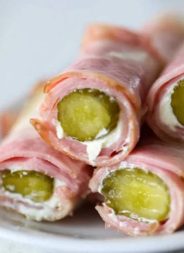 Ham and Pickle Roll-ups with Cream Cheese on a plate