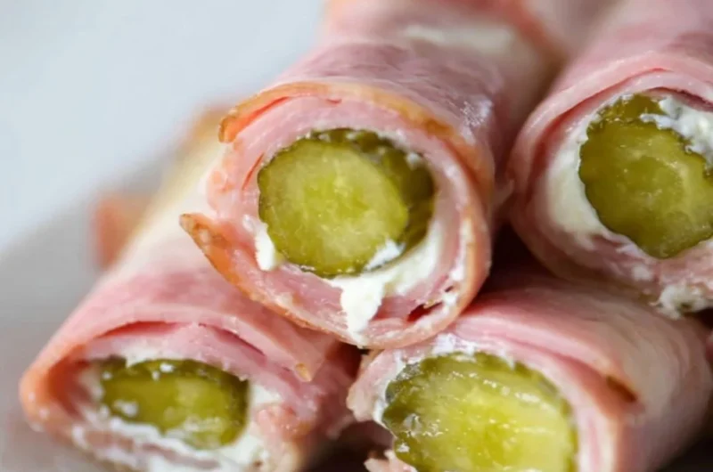 Ham and Pickle Roll-ups with Cream Cheese on a plate