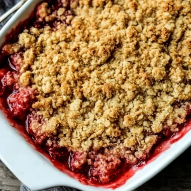 Delicious old-fashioned strawberry rhubarb crisp served in a bowl.