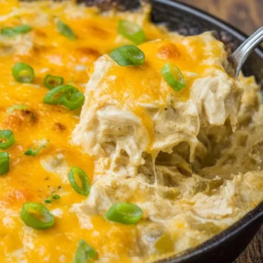 One Pan Keto Green Chili Chicken dish garnished with fresh herbs.