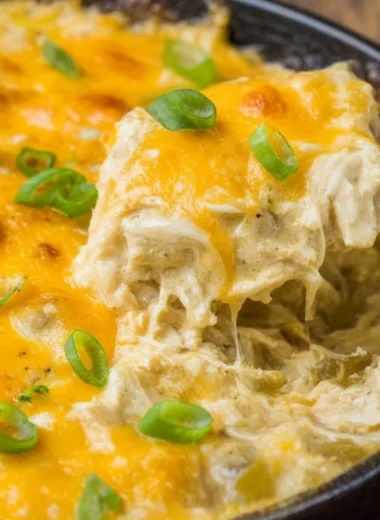 One Pan Keto Green Chili Chicken dish garnished with fresh herbs.