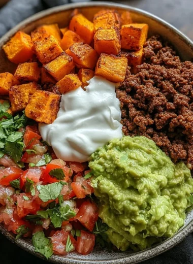 Delicious Sweet Potato Taco Bowl filled with colorful ingredients and vibrant toppings