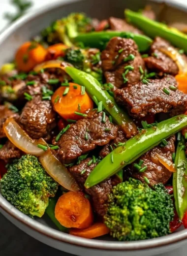 Beef stir fry with vibrant vegetables served on a plate