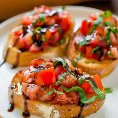 Plate of delicious bruschetta topped with tomatoes and basil