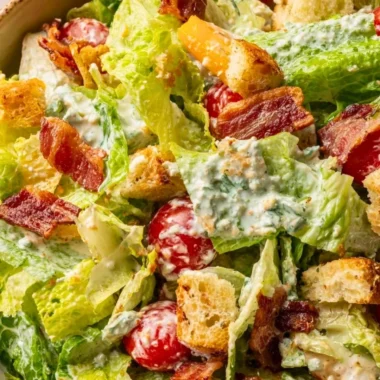 Delicious BLT Salad with bacon, lettuce, and tomatoes served in a bowl