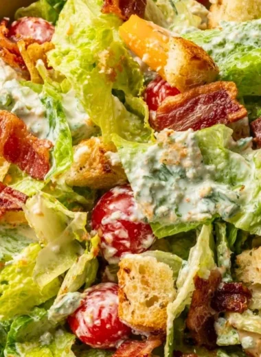 Delicious BLT Salad with bacon, lettuce, and tomatoes served in a bowl