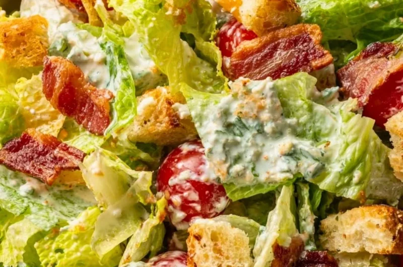 Delicious BLT Salad with bacon, lettuce, and tomatoes served in a bowl
