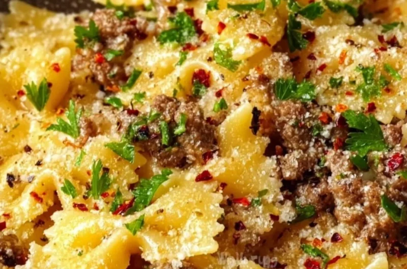 Plate of Garlic Butter Bowtie Pasta with Beef garnished with parsley