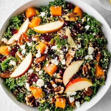 Healthy fall salad made with seasonal ingredients like squash and greens.