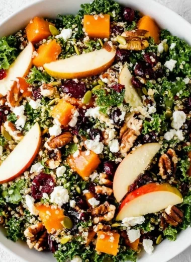 Healthy fall salad made with seasonal ingredients like squash and greens.