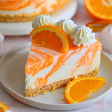 No-bake orange creamsicle cheesecake topped with orange slices