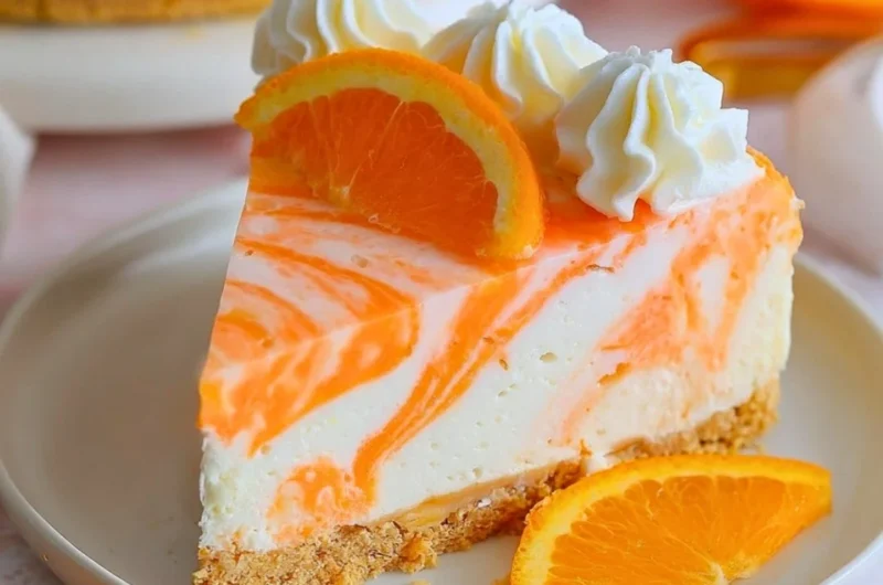 No-bake orange creamsicle cheesecake topped with orange slices