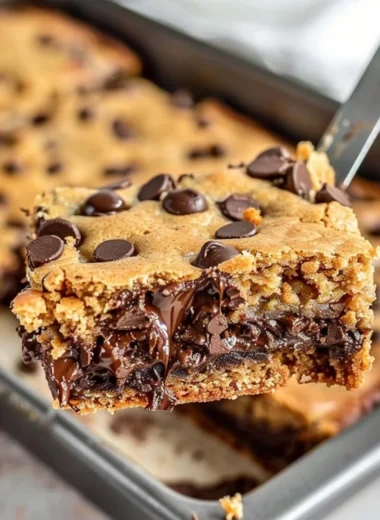 Delicious homemade Peanut Butter Chocolate Chip Bars on a plate