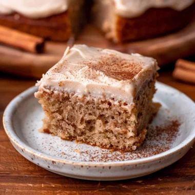Delicious Spiced Chai Cake topped with warm spices and cream frosting