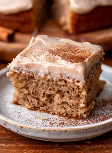 Delicious Spiced Chai Cake topped with warm spices and cream frosting