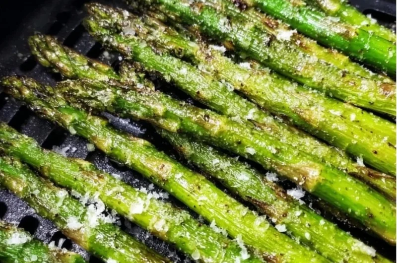 Delicious air fryer roasted asparagus garnished with spices