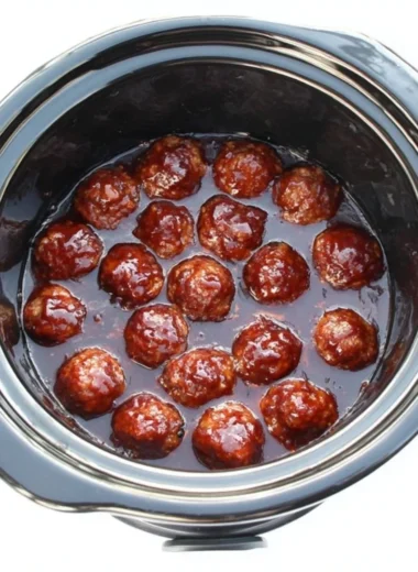 Delicious BBQ meatballs served on a platter with a tangy sauce