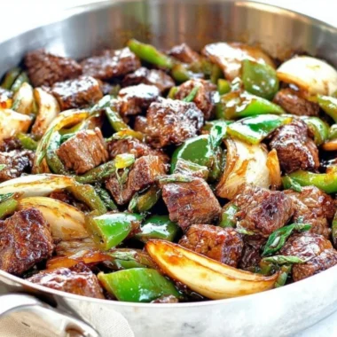 Better-than-takeout teriyaki steak bites with green pepper and onion served in a bowl